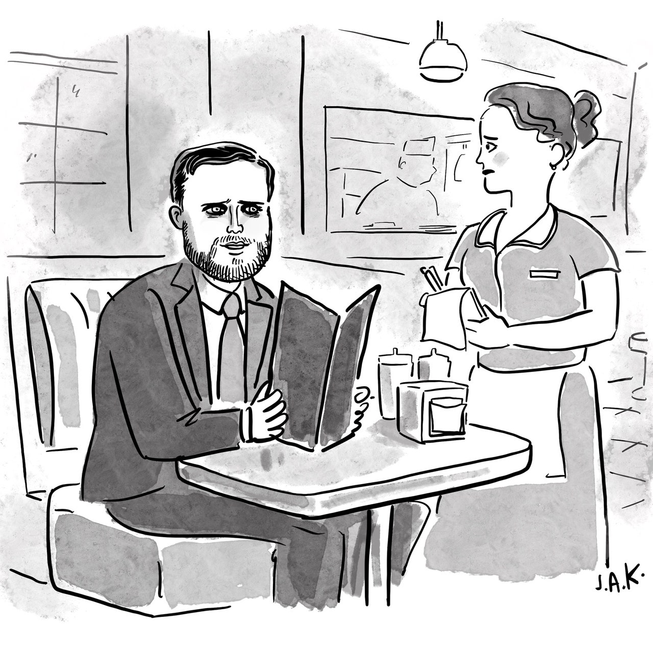 J. D. Vance sits at a diner with a menu open as a waitress prepares to take his order.